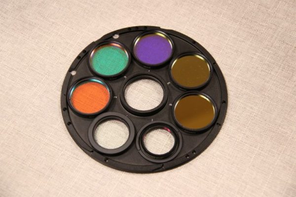 astroasis filter wheel carousel has multiple different size filters screwed into the same filter wheel